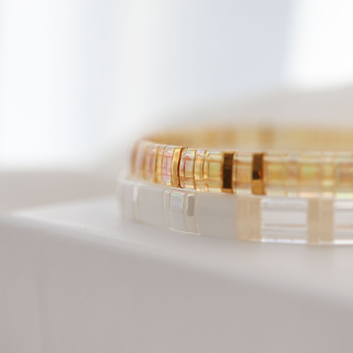 gold bracelets with white